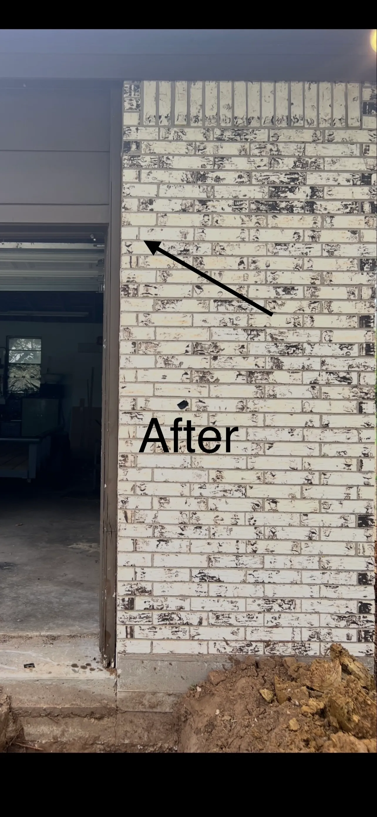 The same garage corner tightened and leveled after the Dual-Pier System repair